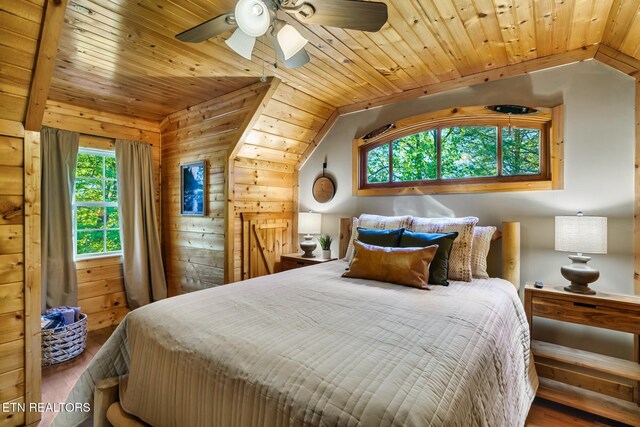 3330 Robeson Rd, Sevierville, TN 37862 - bedroom featuring wood finished floors, vaulted ceiling, wooden ceiling, wood walls, and a ceiling fan