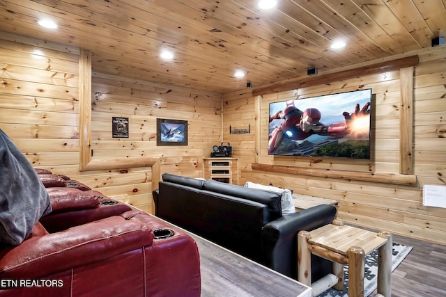cinema room featuring recessed lighting, wood finished floors, wooden walls, and wooden ceiling