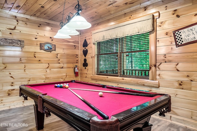 game room featuring wooden walls, wood finished floors, billiards table, and wooden ceiling