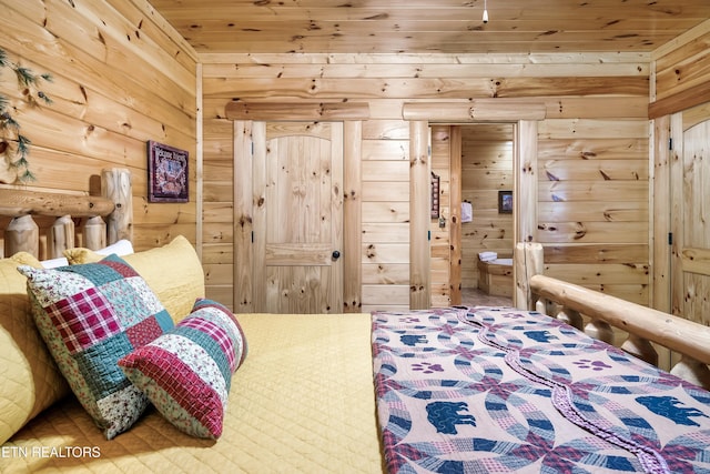 bedroom featuring wooden ceiling and wooden walls