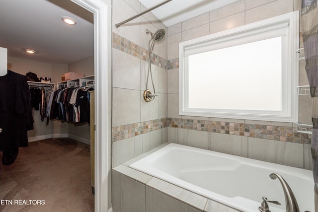 3132 Bakertown Station Way, Knoxville, TN 37931 - bathroom featuring a relaxing tiled tub, a tile shower, a spacious closet, and recessed lighting