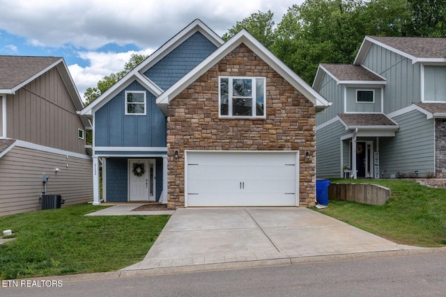 3132 Bakertown Station Way, Knoxville, TN 37931 - craftsman-style home featuring stone siding, a garage, concrete driveway, and a front yard