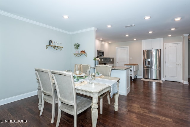 3132 Bakertown Station Way, Knoxville, TN 37931 - dining space with crown molding, dark wood-style flooring, and recessed lighting