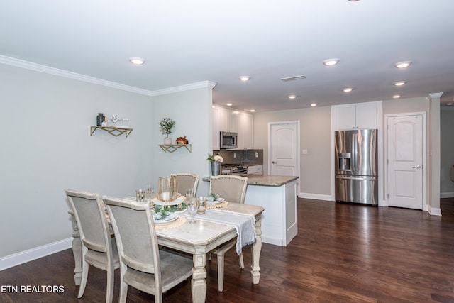 3132 Bakertown Station Way, Knoxville, TN 37931 - dining area with crown molding, recessed lighting, and dark wood-type flooring