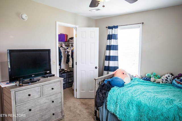 158 Dudley Cir, Tazewell, TN 37879 - bedroom with light colored carpet, a walk in closet, a closet, and a ceiling fan