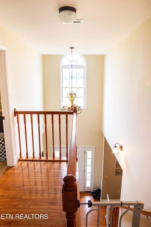 158 Dudley Cir, Tazewell, TN 37879 - stairway with a chandelier and wood finished floors