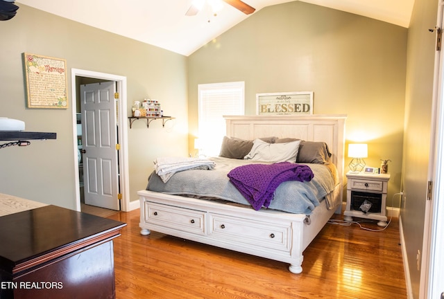 158 Dudley Cir, Tazewell, TN 37879 - bedroom with wood finished floors, vaulted ceiling, baseboards, and a ceiling fan