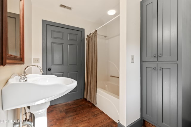 310 Savannah Shores Dr, Delano, TN 37325 - full bathroom with shower / bath combination with curtain and wood finished floors