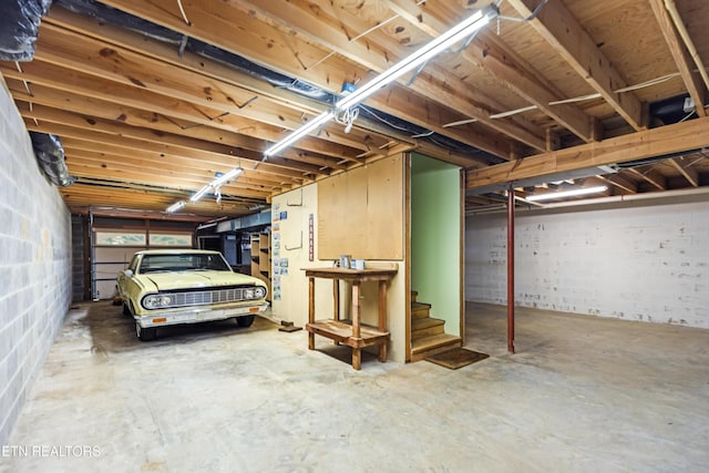 310 Savannah Shores Dr, Delano, TN 37325 - basement with concrete block wall and stairway