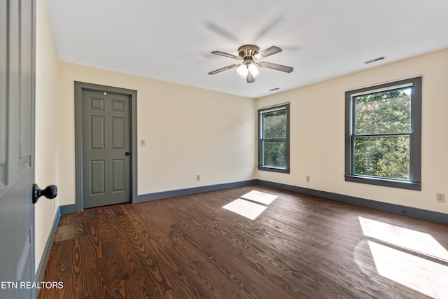 310 Savannah Shores Dr, Delano, TN 37325 - empty room with baseboards, dark wood-style flooring, and ceiling fan