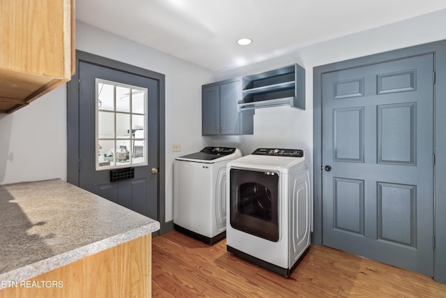 310 Savannah Shores Dr, Delano, TN 37325 - washroom with cabinet space, washing machine and clothes dryer, light wood finished floors, and recessed lighting