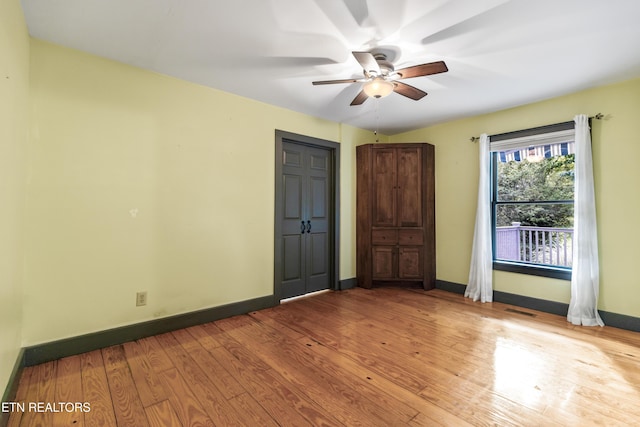 310 Savannah Shores Dr, Delano, TN 37325 - unfurnished room with ceiling fan, baseboards, and light wood-style floors