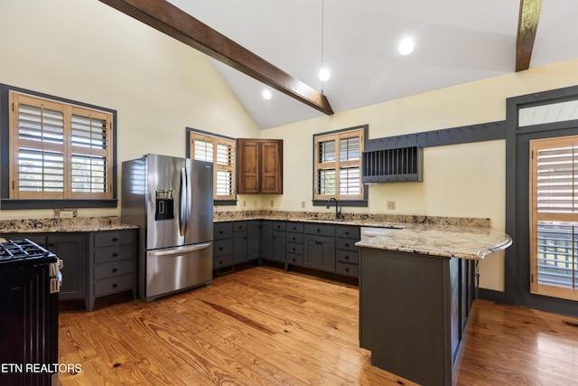 310 Savannah Shores Dr, Delano, TN 37325 - kitchen with stainless steel fridge with ice dispenser, a peninsula, a sink, gray cabinetry, and light wood-style flooring