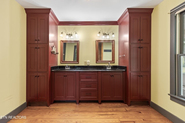 310 Savannah Shores Dr, Delano, TN 37325 - full bath with double vanity, baseboards, wood finished floors, and crown molding