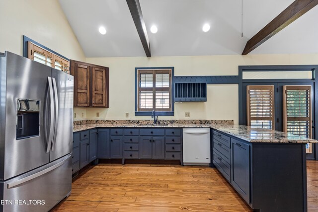310 Savannah Shores Dr, Delano, TN 37325 - kitchen featuring stainless steel fridge with ice dispenser, white dishwasher, a peninsula, a sink, and light stone countertops