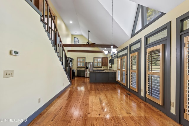 310 Savannah Shores Dr, Delano, TN 37325 - entryway featuring high vaulted ceiling, hardwood / wood-style flooring, a ceiling fan, stairway, and a chandelier