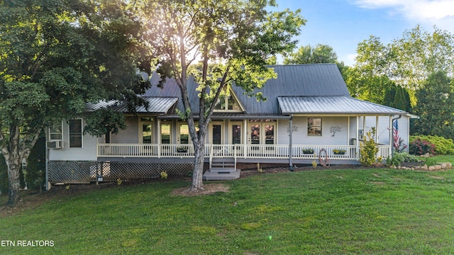 310 Savannah Shores Dr, Delano, TN 37325 - rear view of property with a yard, a porch, and metal roof