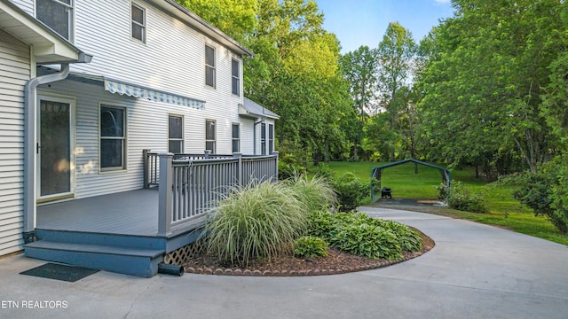 310 Savannah Shores Dr, Delano, TN 37325 - wooden deck with view of scattered trees and a lawn