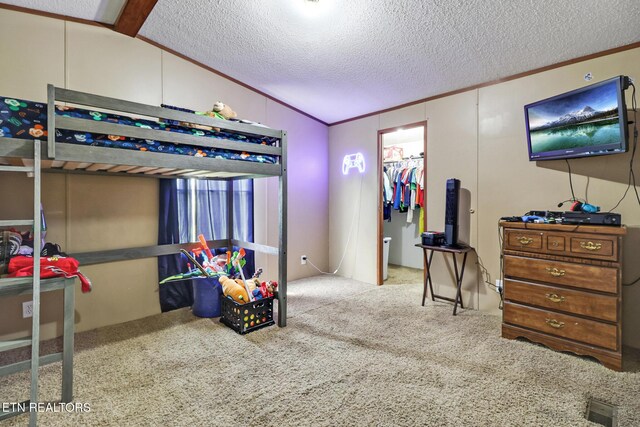 60 Greenview Ln, Crossville, TN 38571 - carpeted bedroom featuring a walk in closet, lofted ceiling, crown molding, and a closet