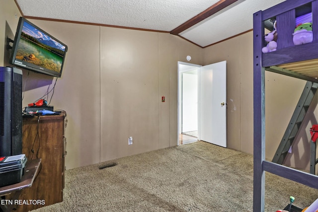 60 Greenview Ln, Crossville, TN 38571 - bedroom featuring carpet floors, vaulted ceiling, ornamental molding, and a decorative wall