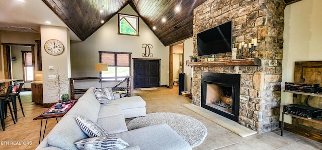 635 Norris Shores Dr, Sharps Chapel, TN 37866 - living area featuring high vaulted ceiling, a fireplace, wooden ceiling, recessed lighting, and baseboards
