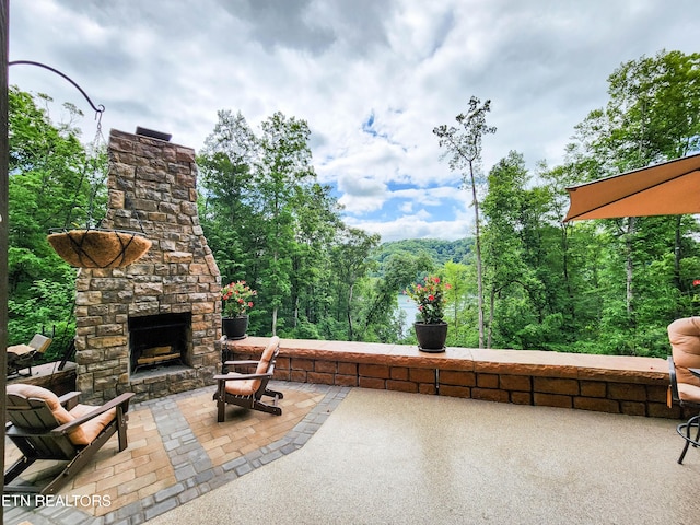 635 Norris Shores Dr, Sharps Chapel, TN 37866 - view of patio / terrace featuring an outdoor stone fireplace