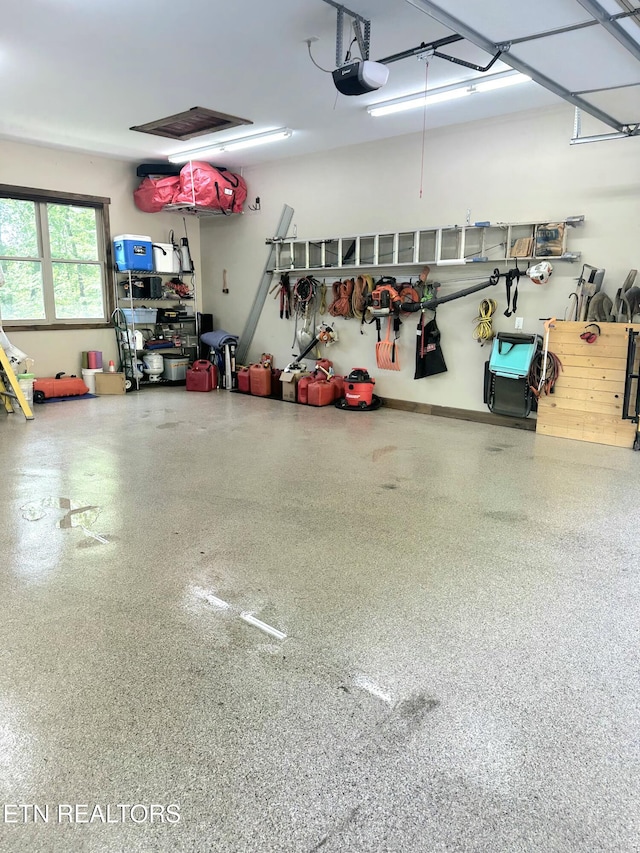 635 Norris Shores Dr, Sharps Chapel, TN 37866 - garage featuring a garage door opener