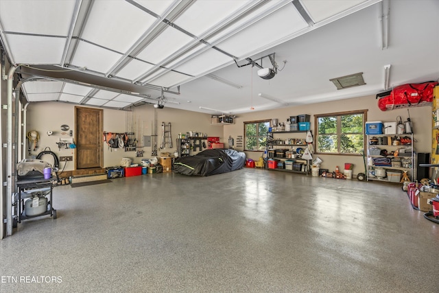 635 Norris Shores Dr, Sharps Chapel, TN 37866 - garage with a garage door opener