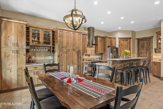 635 Norris Shores Dr, Sharps Chapel, TN 37866 - dining room featuring recessed lighting, a chandelier, bar area, and light tile patterned floors