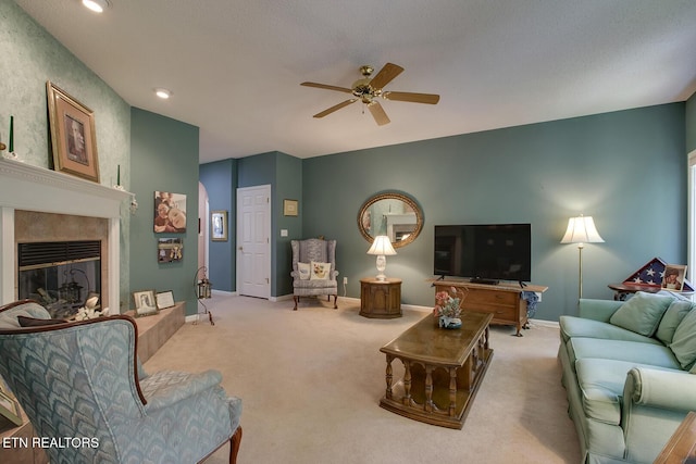 307 Okmulgee Cir, Loudon, TN 37774 - carpeted living room featuring a ceiling fan, a fireplace, baseboards, and recessed lighting