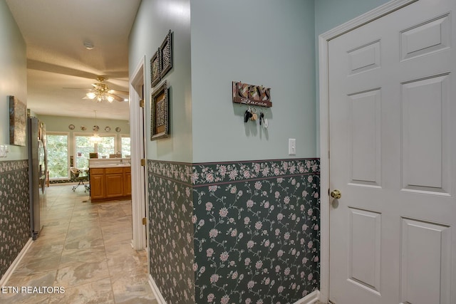 307 Okmulgee Cir, Loudon, TN 37774 - bathroom with a ceiling fan, a wainscoted wall, and vanity