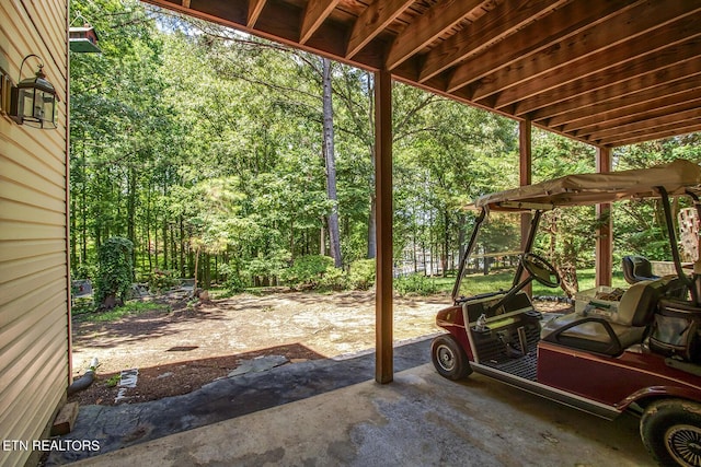 307 Okmulgee Cir, Loudon, TN 37774 - view of patio with a wooded view