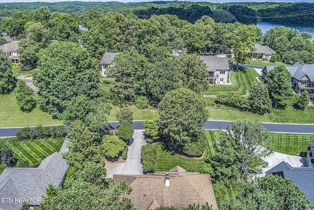 307 Okmulgee Cir, Loudon, TN 37774 - aerial view of residential area with a large body of water and a heavily wooded area