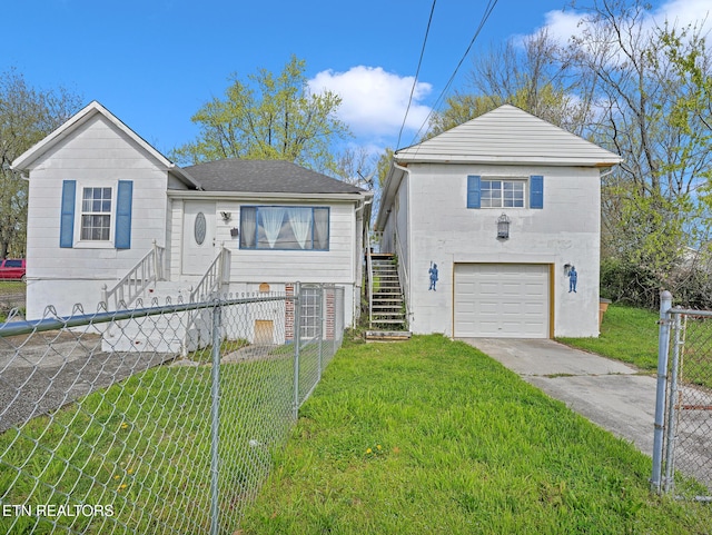 1245 Virginia Ave, Knoxville, TN 37921 - view of front facade featuring stairway, a garage, concrete driveway, and a gate
