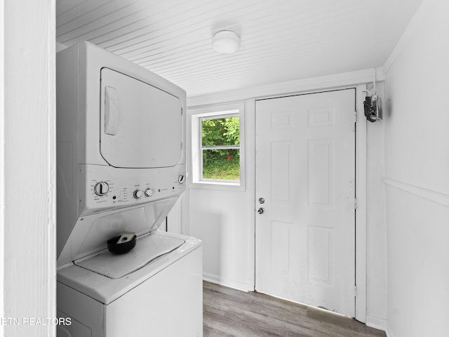 1245 Virginia Ave, Knoxville, TN 37921 - laundry area featuring stacked washer / dryer and light wood-type flooring
