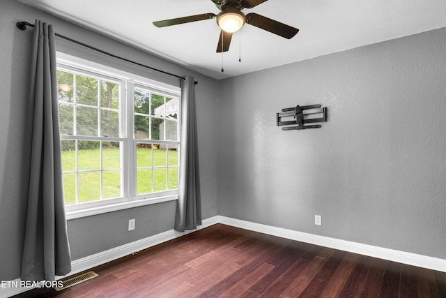 409 Melrose St, Maryville, TN 37803 - spare room featuring dark wood finished floors and ceiling fan