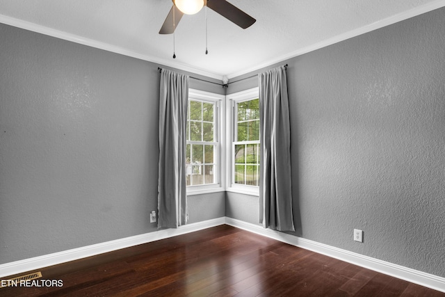 409 Melrose St, Maryville, TN 37803 - spare room featuring dark wood-style flooring, ceiling fan, ornamental molding, and a textured wall