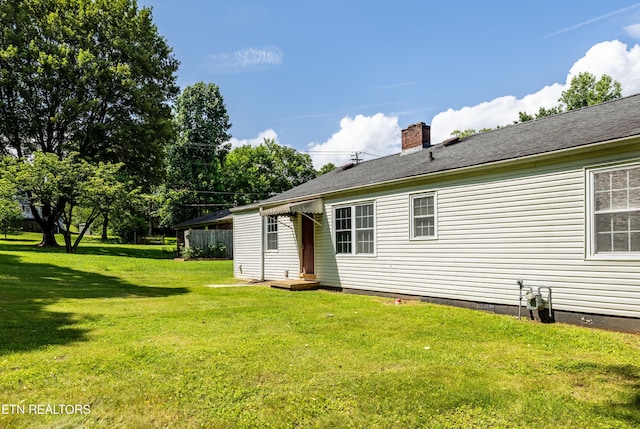 409 Melrose St, Maryville, TN 37803 - rear view of property with a yard and a chimney