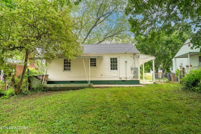 714 E Emerald Ave, Knoxville, TN 37917 - back of house with crawl space and roof with shingles