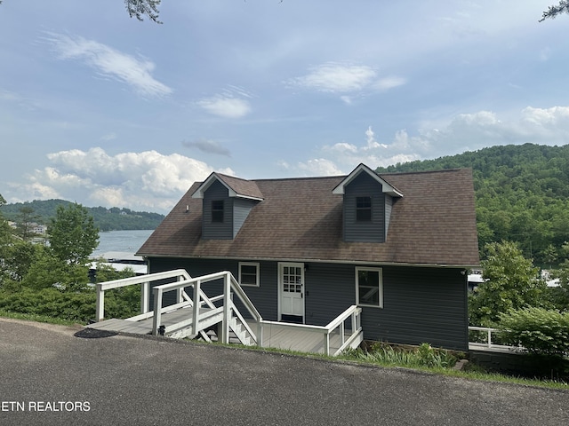 148 Mariner Point Rd, Lafollette, TN 37766 - view of front of house featuring a water view, a shingled roof, and a wooded view