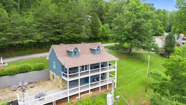 148 Mariner Point Rd, Lafollette, TN 37766 - back of property featuring a balcony, a forest view, and roof with shingles