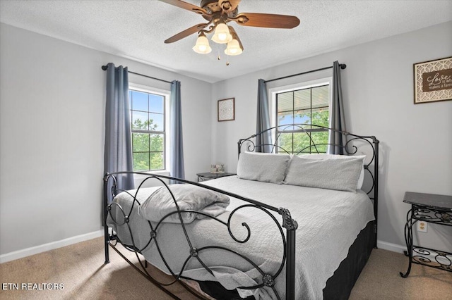 148 Mariner Point Rd, Lafollette, TN 37766 - carpeted bedroom with a textured ceiling, baseboards, and ceiling fan