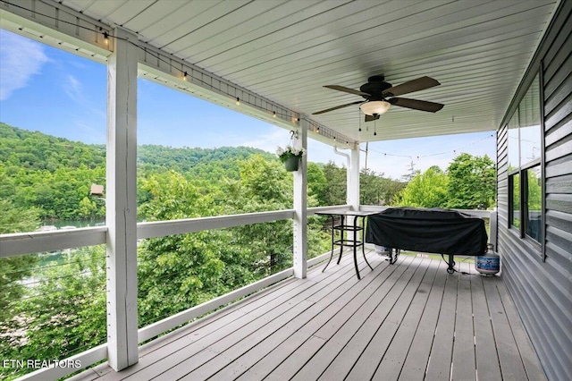 148 Mariner Point Rd, Lafollette, TN 37766 - wooden deck featuring ceiling fan, a forest view, and grilling area