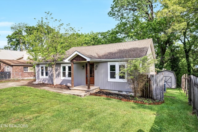722 Southern Pkwy, Athens, TN 37303 - ranch-style house featuring a storage shed, an outbuilding, and a shingled roof