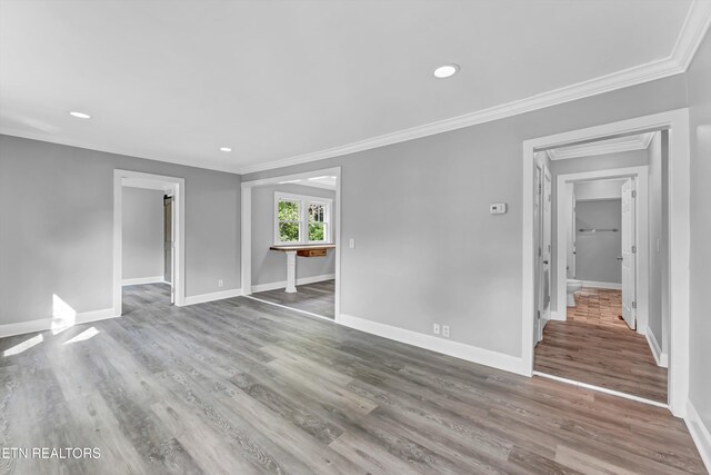 722 Southern Pkwy, Athens, TN 37303 - empty room featuring baseboards, ornamental molding, wood finished floors, and recessed lighting