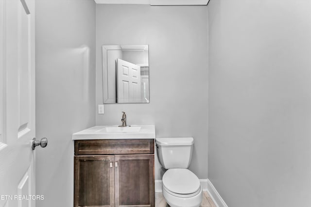 722 Southern Pkwy, Athens, TN 37303 - half bath with toilet, vanity, and baseboards