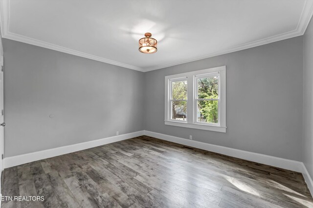 722 Southern Pkwy, Athens, TN 37303 - unfurnished room with ornamental molding, baseboards, and wood finished floors