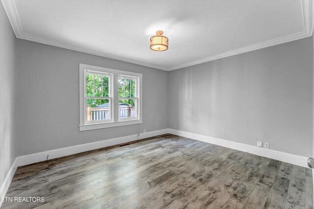 722 Southern Pkwy, Athens, TN 37303 - unfurnished room featuring wood finished floors, ornamental molding, and baseboards