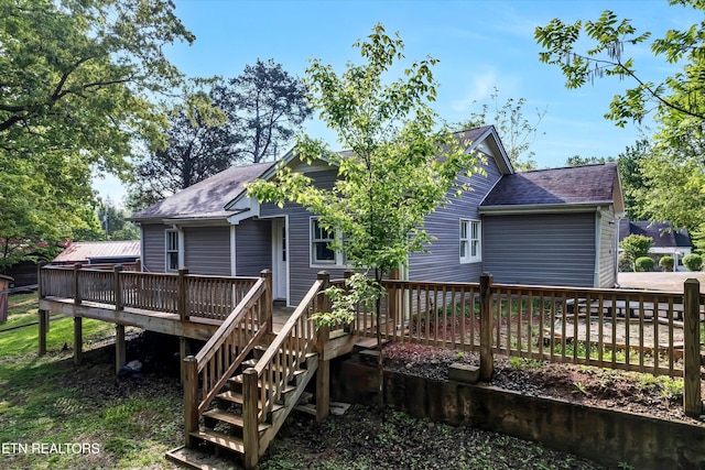722 Southern Pkwy, Athens, TN 37303 - rear view of property featuring a shingled roof, a deck, and a garage