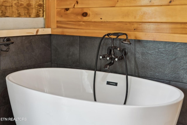bathroom featuring a freestanding tub